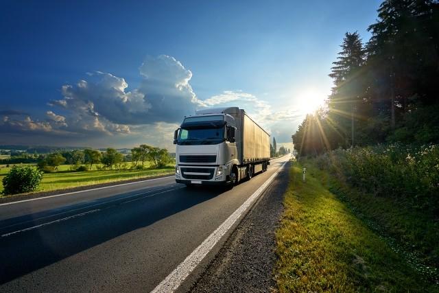 A semi-truck transports goods in Europe